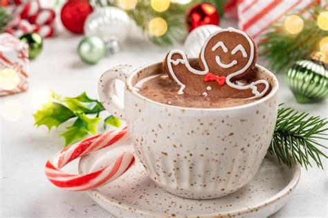 Premium Photo Gingerbread Cookie Man In A Cup Of Hot Chocolate