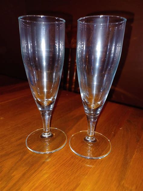 2 champagne flutes | EstateSales.org