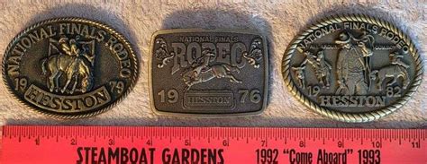 "Hesston" Belt Buckles (3 Total) - Legacy Auction Company