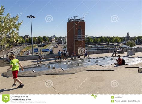 People Rest on the Roof of the NEMO Museum Building in Amsterdam ...