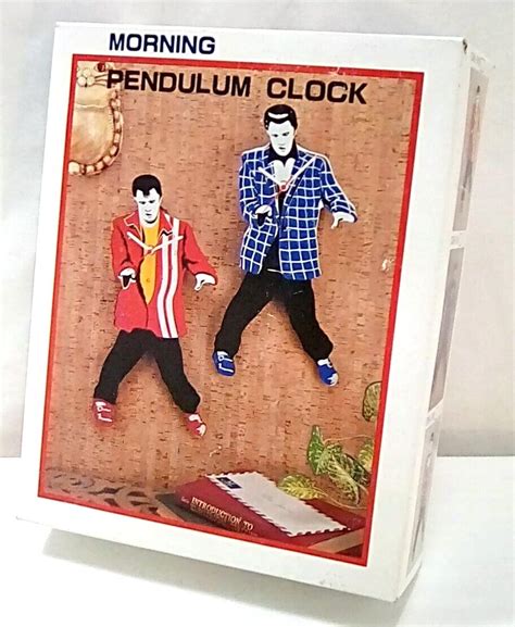 Nos Elvis Presley Morning Pendulum Clock Swinging Legs White Suit Dh 30x 4662744577