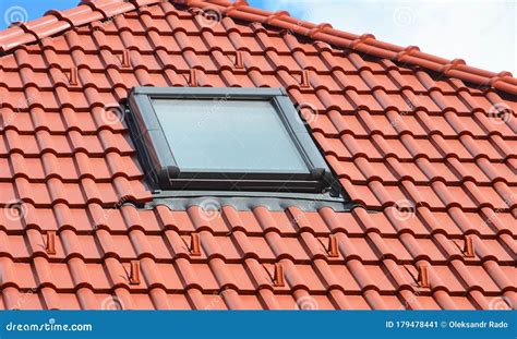 Skylight On Red Ceramic Tiles House Roof With Rain Gutter Skylights