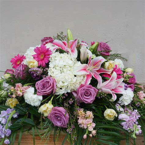 For Her Casket Spray Carrollwood Florist