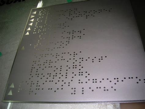 PLACAS BRAILLE ACERO INOXIDABLE Sobre Relieve Con Bolitas