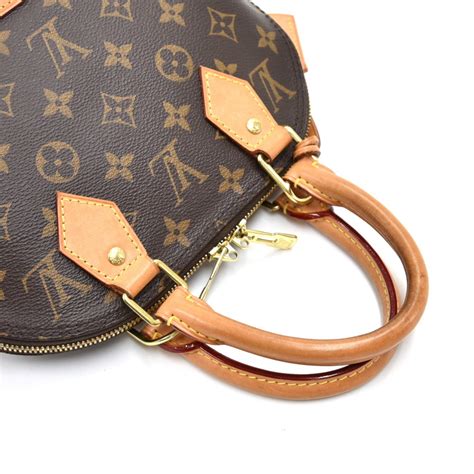 Louis Vuitton Louis Vuitton Alma BB Monogram Canvas Handbag