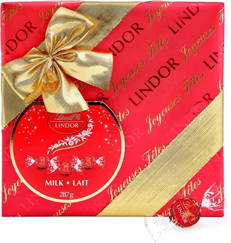 Lindt Boîte Cadeau LINDOR Chocolat au Lait Cœur Fondant 287g