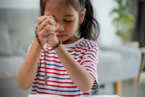 Girl Praying Stock Photos, Images and Backgrounds for Free Download