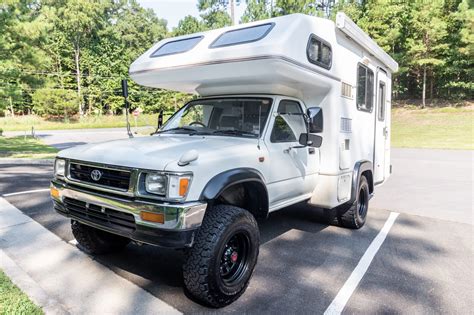 This Rare 1994 Toyota Hilux Overland Camper On Bring a Trailer Was Cheaper Than a 2022 Toyota Tacoma