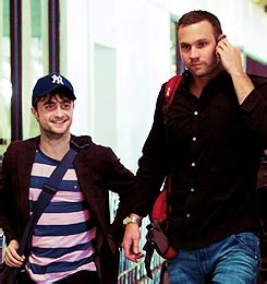 sir-radcakes, potterbird: Daniel Radcliffe and his bodyguard...