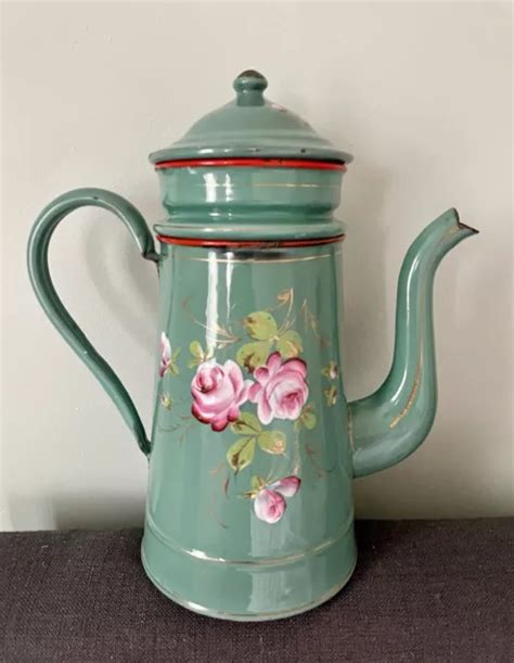 ANCIENNE ET JOLIE cafetière en tôle émaillée au décor de fleurs en