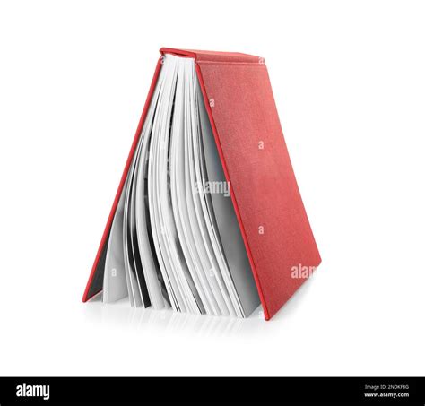 Book with red cover on white background Stock Photo - Alamy