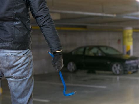 cars parked  rutgers parking lots broken  police