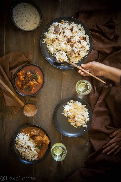 Ghee Rice And Chicken Curry In Roasted Coconut Gravy Neychoor With