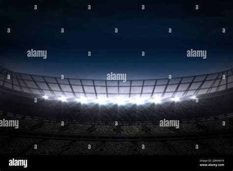 Digitally generated large football stadium under night sky Stock Photo ...