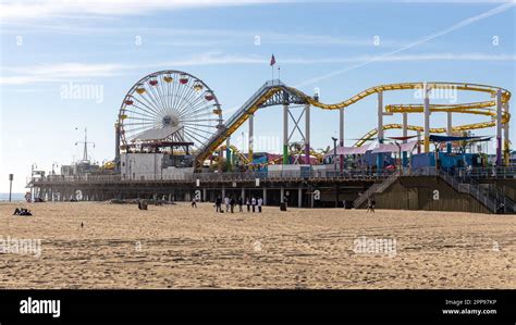 The Iconic Santa Monica Pier With Carnival Rides Located In Santa Monica California Usa Taken On