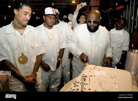 Rick Ross and Friends Rick Ross cuts his birthday cake during his 'Big ...