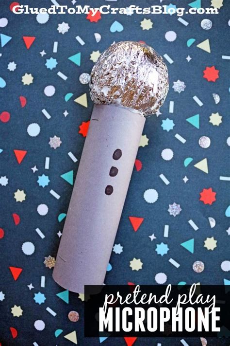 a microphone made out of toilet paper and some confetti on top of it