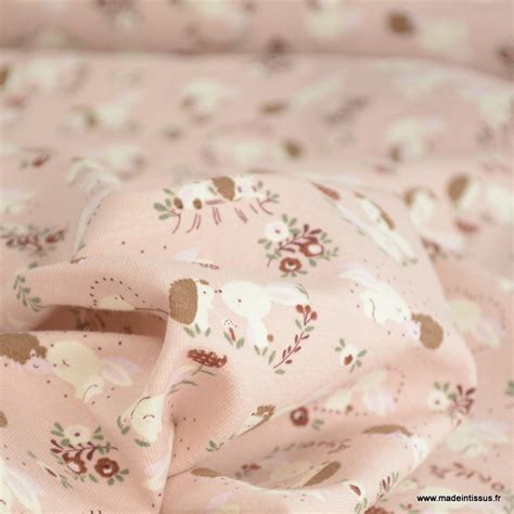 Tissu Jersey Motif H Rissons Lapins Et Fleurs Fond Saumon Oeko Tex