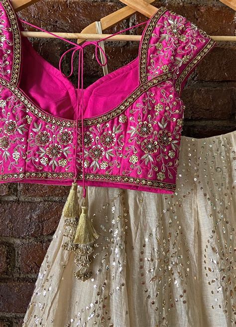 rani pink  ivory beige gold lehenga set  simple lehenga raw
