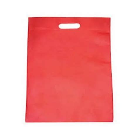 Plain Red D Cut Non Woven Bag Capacity 3 Kg Size Dimension 9 X 12