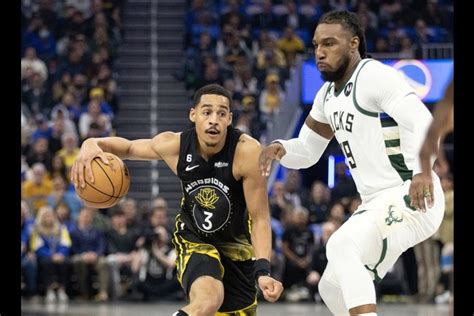 Stephen Currys Late Burst Rallies Warriors Past Bucks In Ot