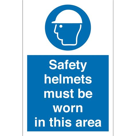 Safety Helmets Must Be Worn In This Area Signs From Signs Uk