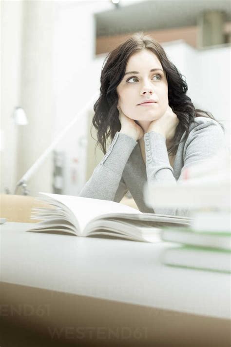 Distracted Student In A University Library Stock Photo