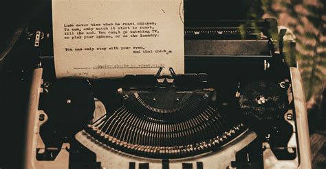 White Typewriter With Paper Inserted · Free Stock Photo