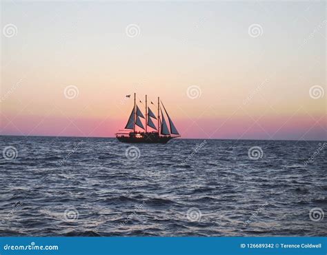 Sailing Ship Sunset Silhouette Stock Photo - Image of sailing, ship ...