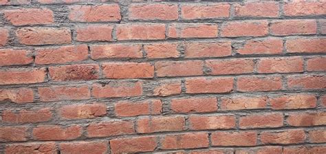 Red brick wall background 11477734 Stock Photo at Vecteezy