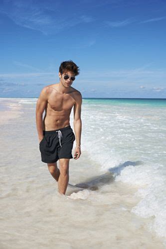 symbolic beach photography poses  men macho vibes
