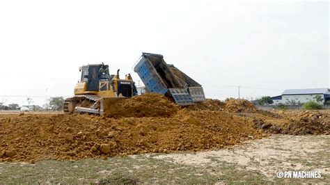 New Project Land Filling By Ton Dump Truck Unloading Strong Dozer