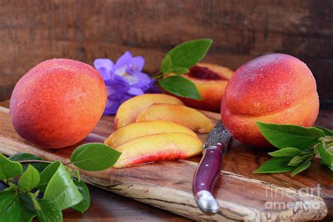 Fresh Nectarines On Rustic Wood Background Photograph By Milleflore