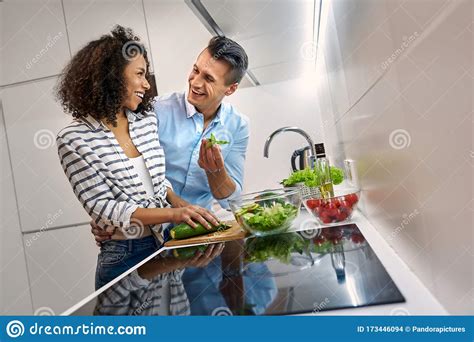 Romantic Date Young Multiethnic Couple Standing At Kitchen Cooking