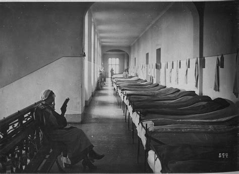 2 A Nurse Reading In The Makeshift Hospital Ward That Was Converted