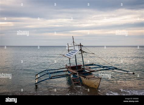 Traditional Outrigger Fishing Boat Fitted As Tourist Transport At Sugar