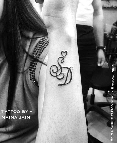 Awesome Couple Tattoo Initials S And D For Beautiful Couple Tattoo Designed By Naina Jain Na