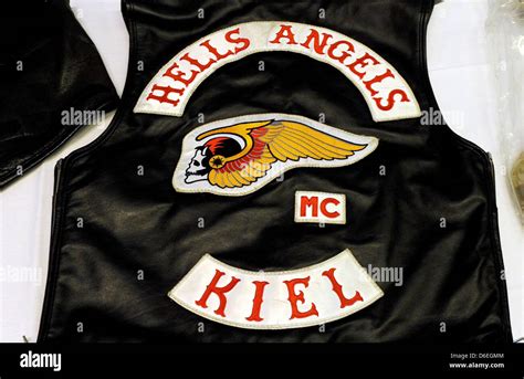 A Hells Angels vest confiscated by police, a police radio and a Stock ...