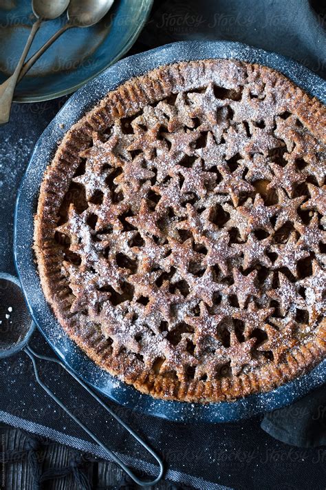 "Apple Pie In Baking Dish With Icing Sugar" by Stocksy Contributor ...