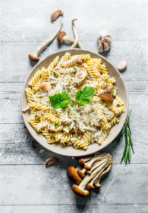 Fusilli Pasta With Mushrooms Cheese And Rosemary Stock Photo By Artem Ka2