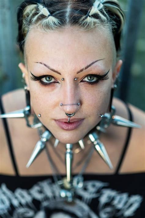 Portrait Of Young Sexy Seductive Gothic Girl With Piercings Stock