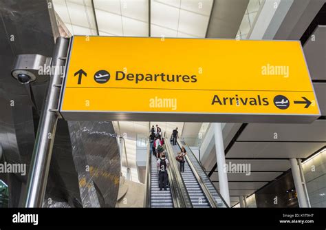 Arrivals And Departures Signage At Heathrow Airport Terminal Two