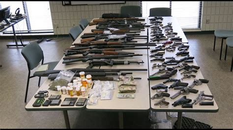 Guns Thousands Of Rounds Of Ammo Seized During Drug Raid At