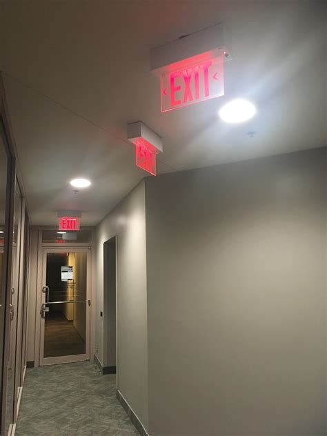 Someone Went A Little Nuts With The Exit Signs There Is Actually A 4th One That’s Down The Hall