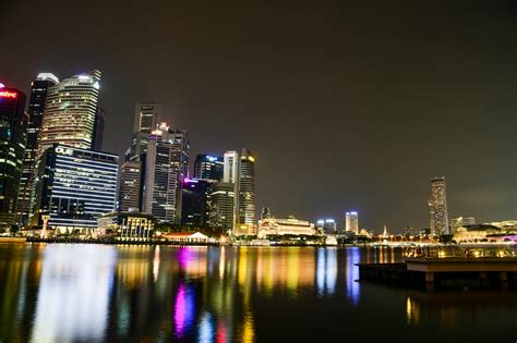 High-rise Buildings During Night Time · Free Stock Photo