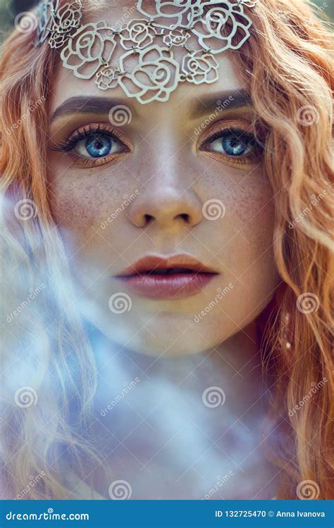 Beautiful Redhead Norwegian Girl With Big Eyes And Freckles On Face In The Forest Portrait Of