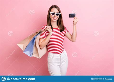 Photo Of Cute Millennial Brunette Lady Hold Card Bags Wear Eyewear