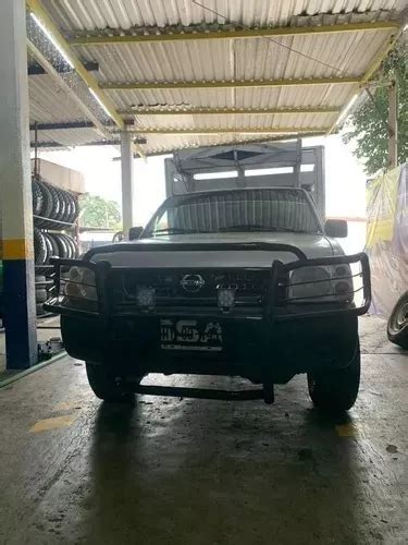 Busca Defensa Tumbaburro Burrera Nissan Np Frontier A La