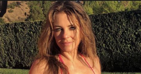 57 Year Old Elizabeth Hurley Dances And Shows Off Her Boobs In A Blue Bikini Blacksportsonline