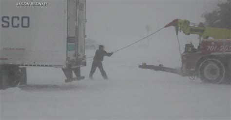 North Dakota slammed with more than 2 feet of snow, causing whiteouts ...